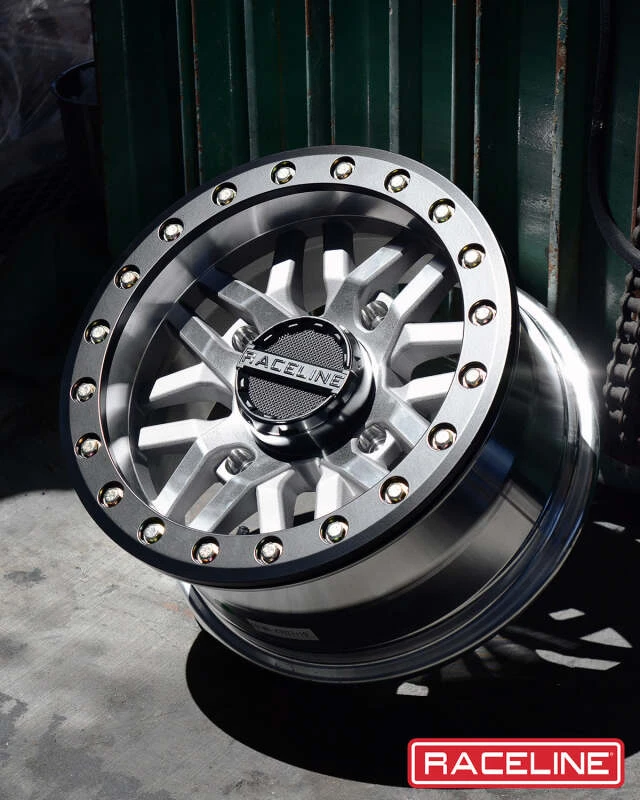 Raceline A91MA Ryno 14x7in/4x156 BP/10mm Offset/132.5mm Bore - Machined & Black Ring Beadlock Wheel