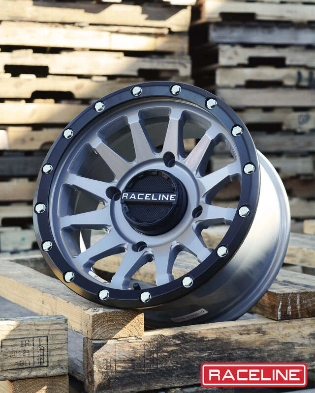 Raceline A95SG Trophy 14x7in / 4x137 BP / 10mm Offset / 110.18mm Bore - Grey & Black Lip Wheel