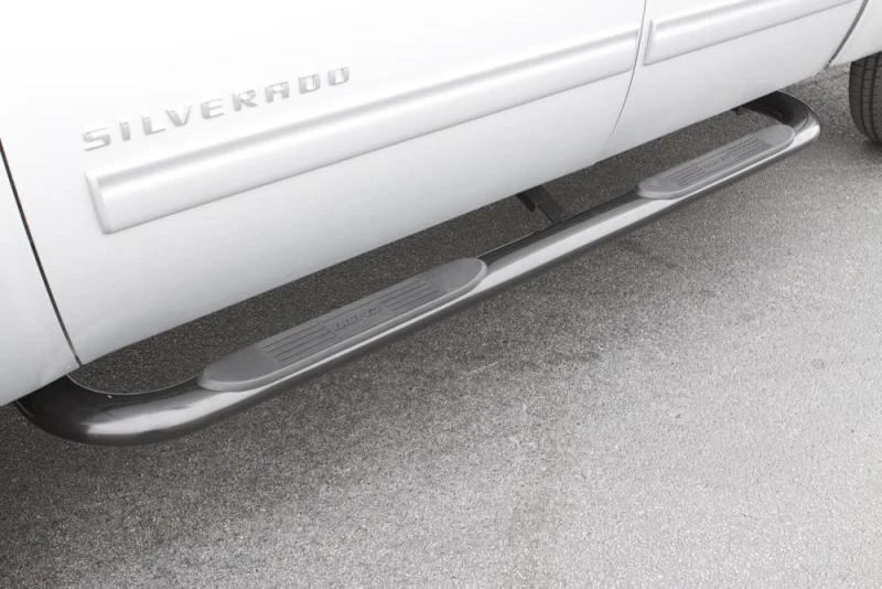 Lund 99-13 Chevy Silverado 1500 Ext. Cab (Body Mount) 4in. Oval Curved SS Nerf Bars - Polished