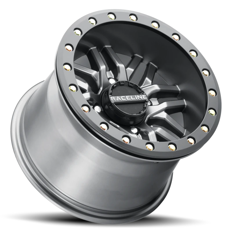 Raceline A91G Ryno 15x7in/4x156 BP/10mm Offset/132.5mm Bore - Gunmetal & Black Ring Beadlock Wheel