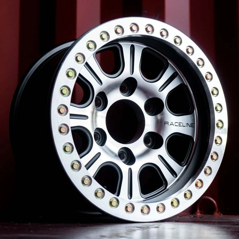 Raceline RT232 Monster 17x8.5in/8x165.1 BP/-25mm Offset/130.81mm Bore - Black & MACH. Beadlock Wheel