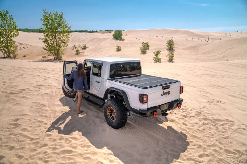 AMP Research 2007-2018 Jeep Wrangler JKU 4DR PowerStep XL - Black (Incl OEM Style Illumination)