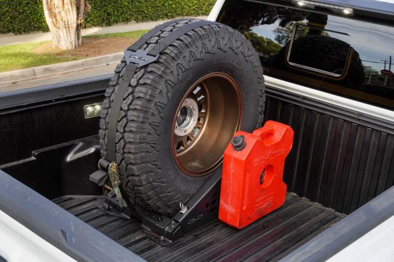 DV8 Offroad Truck Bed Universal Tire Carrier & Accessory Mount