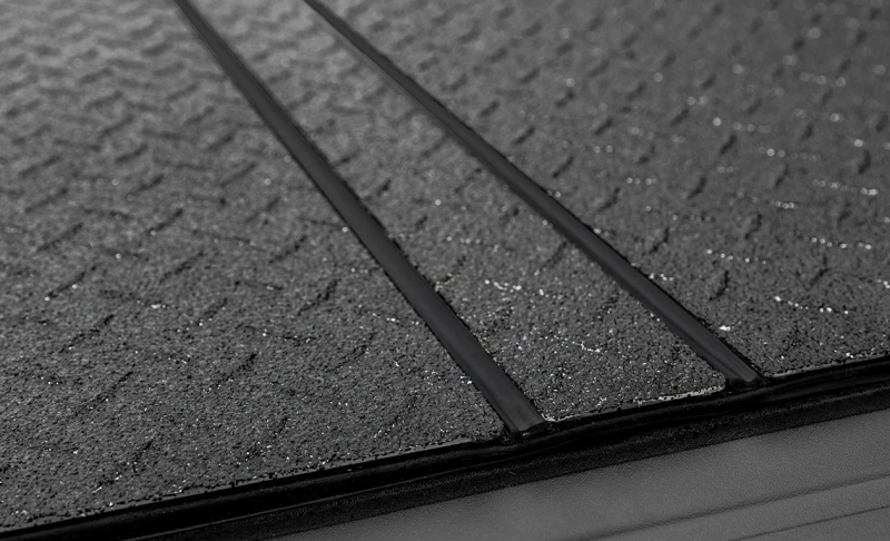 Access 2022+ Rivian R1T 4ft 6in Bed (w/ OEM Tonneau Track) LOMAX Folding Hard Cover - Black Diamond