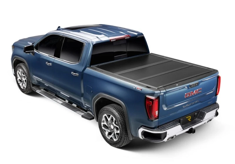 UnderCover Select Hard Folding Tonneau Cover für 2016–2025 Nissan Titan 6'7" Bed mit Utili-Track System